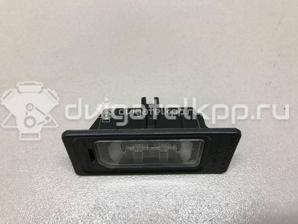 Фото Фонарь подсветки номера  4G0943021 для Audi A4 / A6 / A3 / A5 / Tt {forloop.counter}}