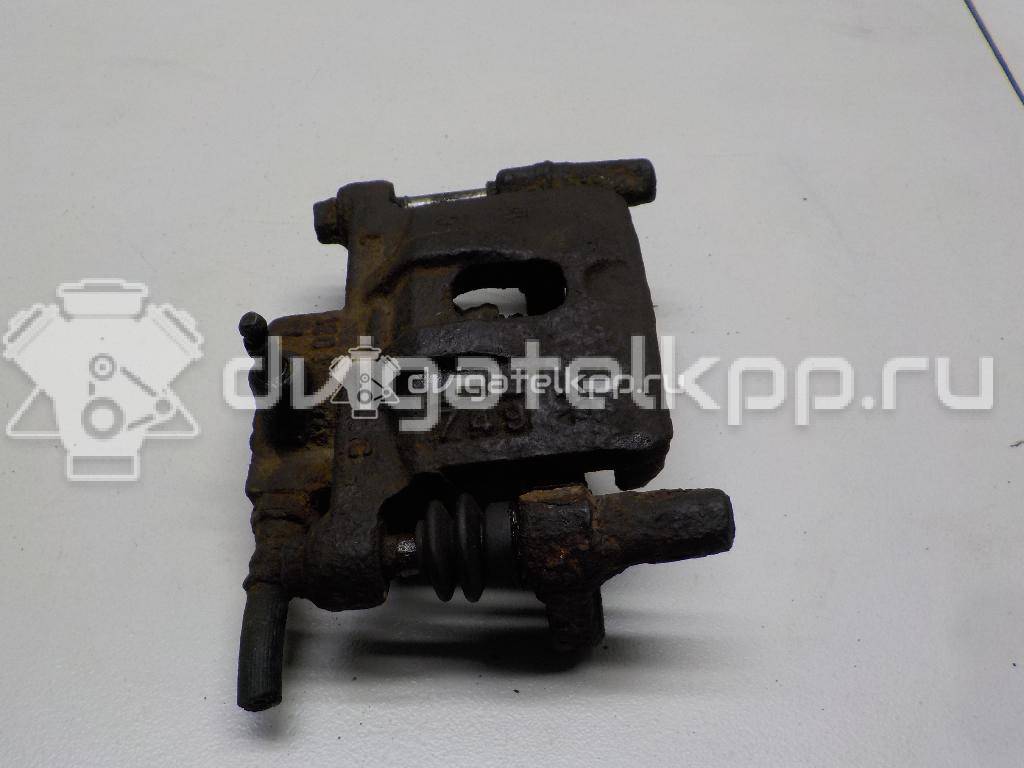 Фото Суппорт тормозной задний левый  MR955065 для Mitsubishi Lancer / Outlander / Grandis Na W {forloop.counter}}