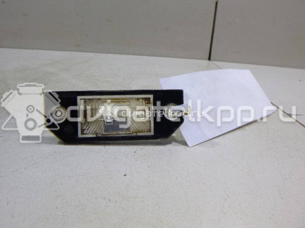 Фото Фонарь подсветки номера  4502331 для Ford Focus / C-Max {forloop.counter}}