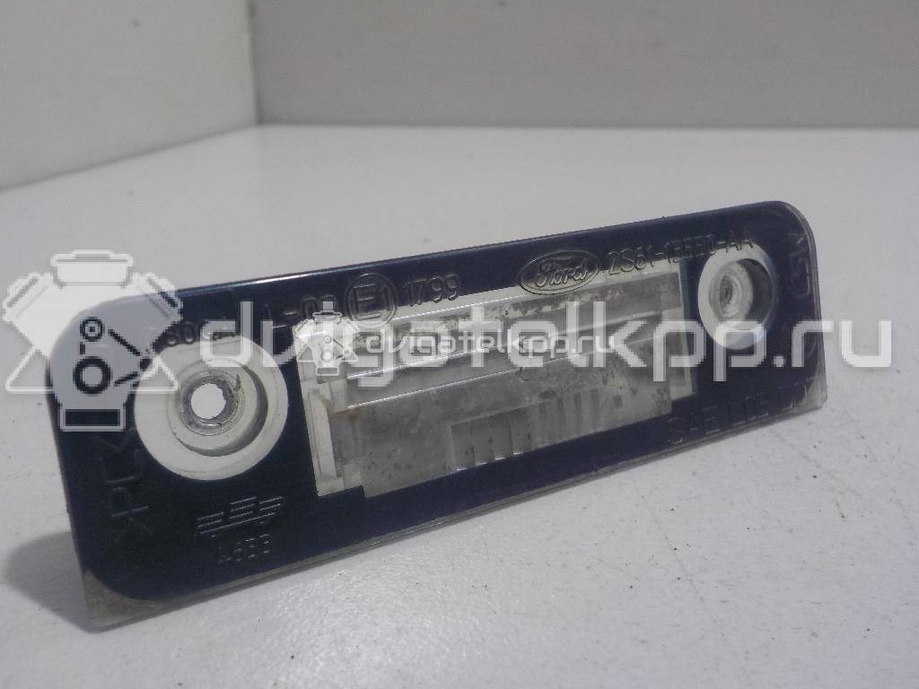 Фото Фонарь подсветки номера  1332916 для Ford Fiesta / Mondeo / Fusion Ju {forloop.counter}}