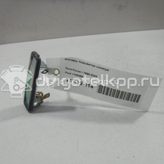 Фото Фонарь подсветки номера  1109489 для Ford Focus