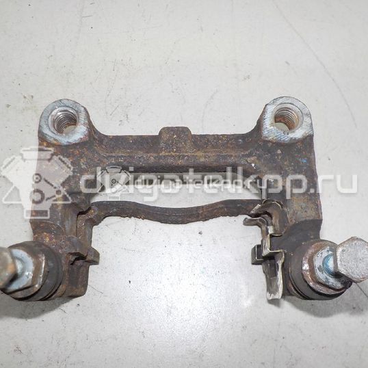 Фото Скоба суппорта заднего  1460288 для Ford Focus / Galaxy / Kuga / S-Max / Mondeo