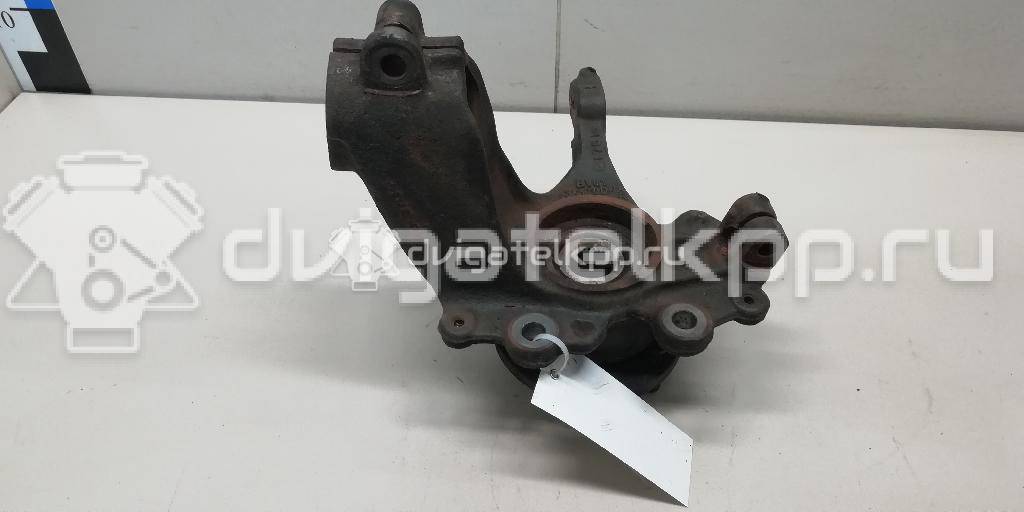 Фото Кулак поворотный передний правый  1702854 для Ford Focus {forloop.counter}}