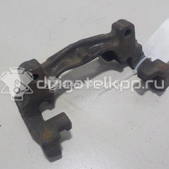 Фото Скоба суппорта переднего  1432360 для Ford Fiesta / Focus / Tourneo / Scorpio / Sierra