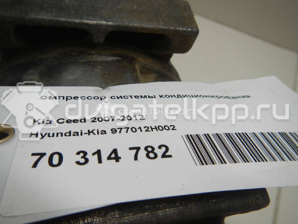 Фото Компрессор системы кондиционирования  977012H002 для Hyundai I30 / Elantra {forloop.counter}}