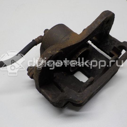 Фото Суппорт тормозной передний левый  581102E000 для Hyundai Tucson