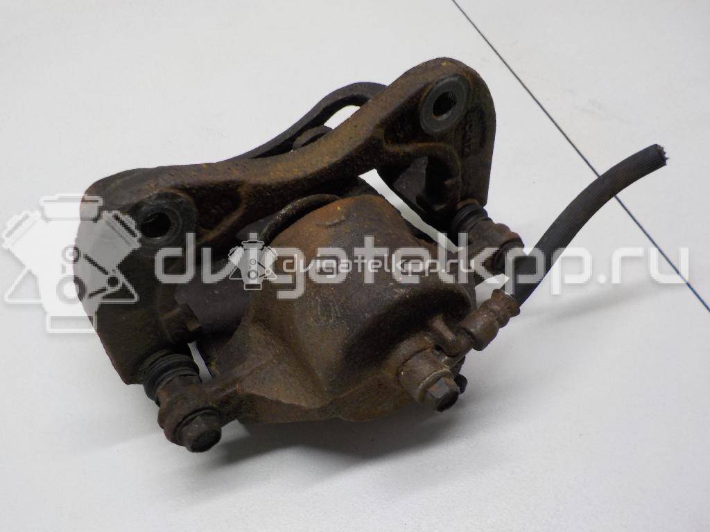 Фото Суппорт тормозной передний левый  581102E000 для Hyundai Tucson {forloop.counter}}