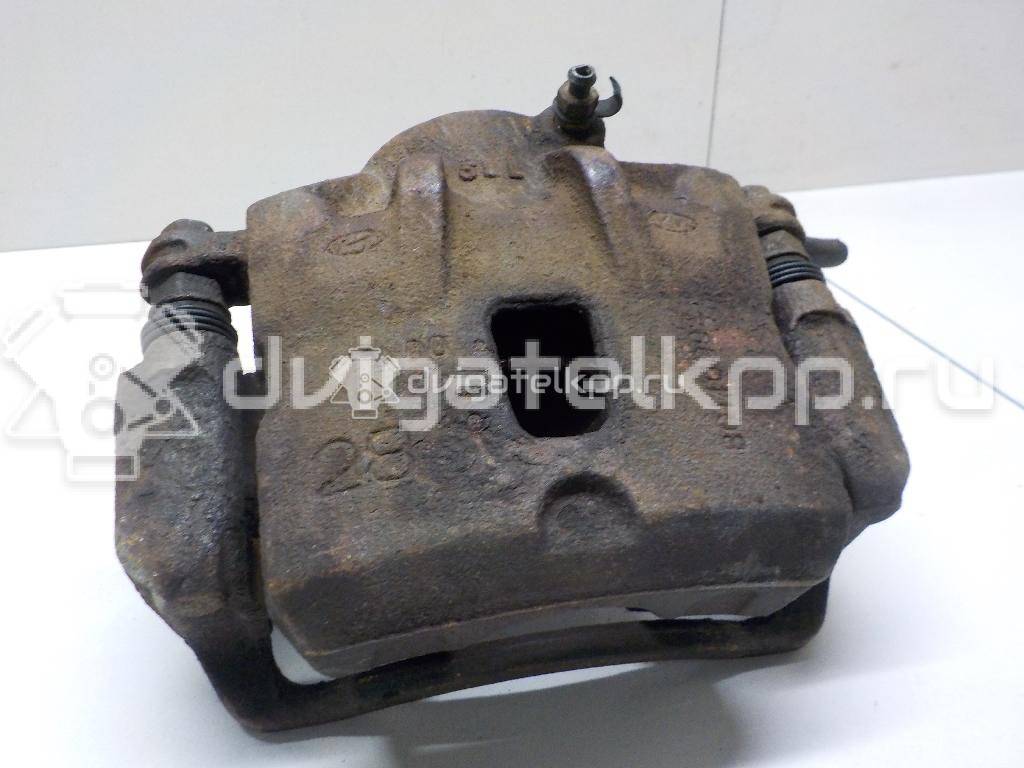 Фото Суппорт тормозной передний левый  581102E000 для Hyundai Tucson {forloop.counter}}