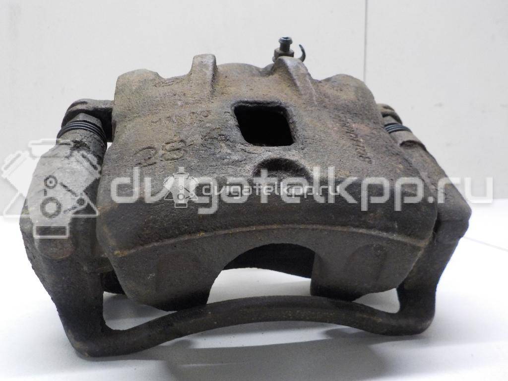 Фото Суппорт тормозной передний левый  581102E000 для Hyundai Tucson {forloop.counter}}