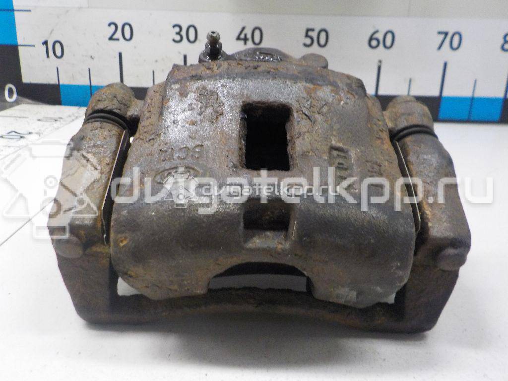 Фото Суппорт тормозной передний правый  58130FDC00 для Kia Rio / Shuma Fb {forloop.counter}}
