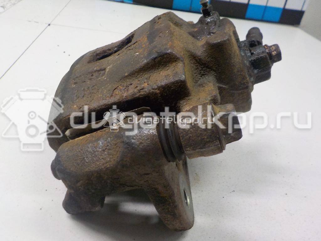 Фото Суппорт тормозной передний правый  58130FDC00 для Kia Rio / Shuma Fb {forloop.counter}}