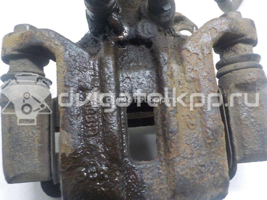 Фото Суппорт тормозной задний правый  583111YA50 для Kia Picanto {forloop.counter}}