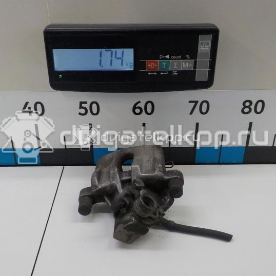 Фото Суппорт тормозной задний левый  1365653 для mazda Mazda 3 (BK)