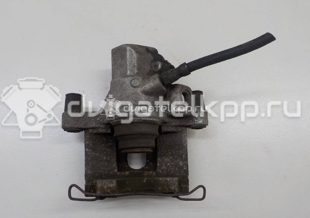 Фото Суппорт тормозной задний левый  1365653 для mazda Mazda 3 (BK) {forloop.counter}}