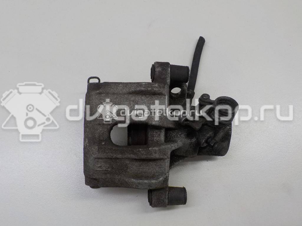 Фото Суппорт тормозной задний левый  1365653 для mazda Mazda 3 (BK) {forloop.counter}}