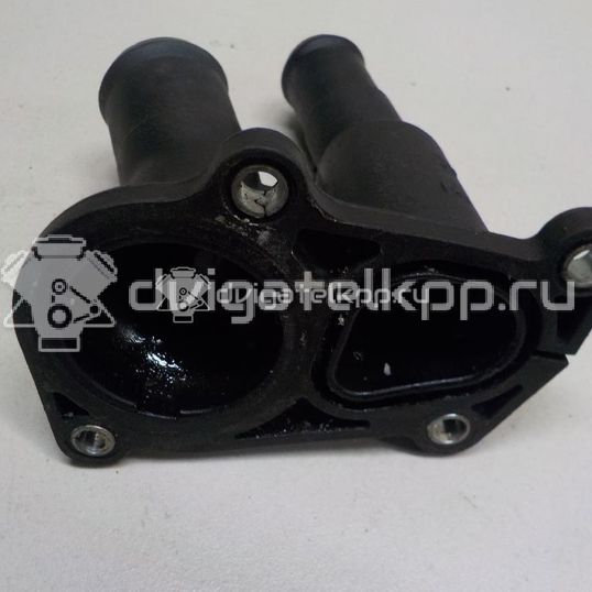 Фото Крышка термостата  2S6G9K478BB для Ford Fiesta / Focus / C-Max / Grand / B-Max Jk