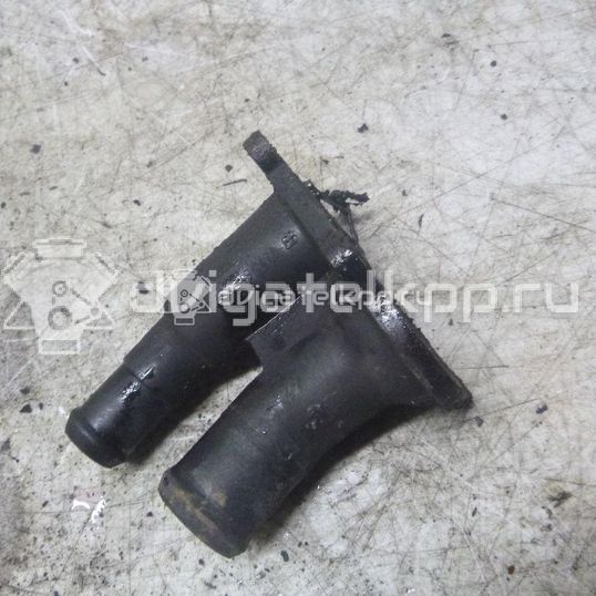 Фото Крышка термостата  2S6G9K478BB для Ford Fiesta / Focus / C-Max / Grand / B-Max Jk