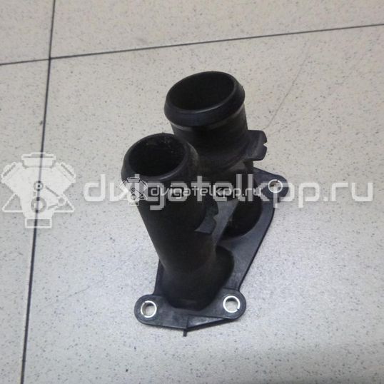 Фото Крышка термостата  1707050 для Ford Fiesta / Focus / C-Max / Ka / Grand