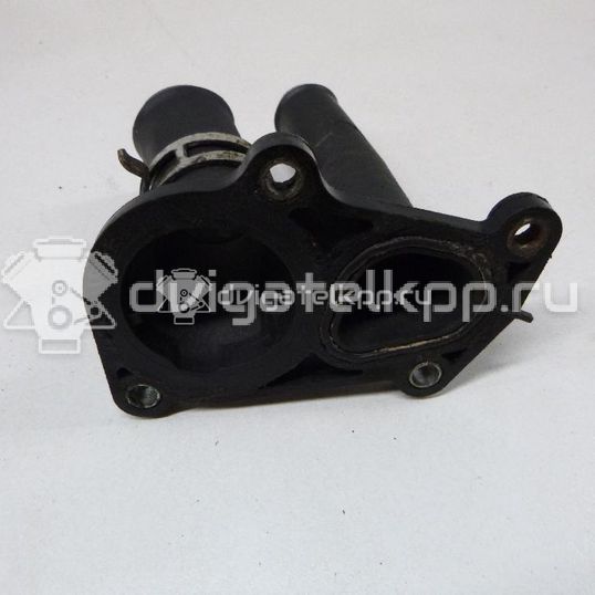 Фото Крышка термостата  1707050 для Ford Fiesta / Focus / C-Max / Ka / Grand