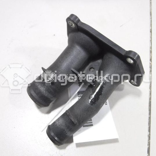 Фото Крышка термостата  1707050 для Ford Fiesta / Focus / C-Max / Ka / Grand