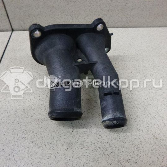 Фото Крышка термостата  1707050 для Ford Fiesta / Focus / C-Max / Ka / Grand