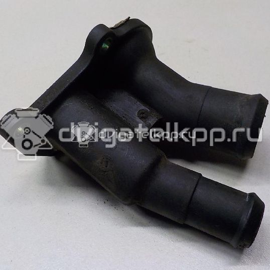 Фото Крышка термостата  1707050 для Ford Fiesta / Focus / C-Max / Ka / Grand