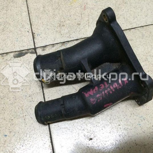 Фото Крышка термостата  1707050 для Ford Fiesta / Focus / C-Max / Ka / Grand