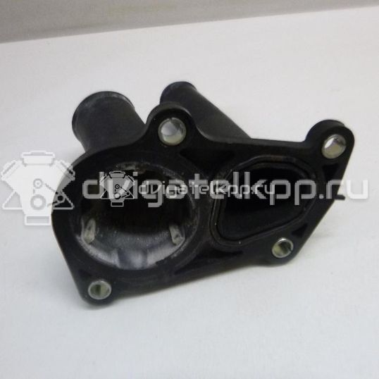 Фото Крышка термостата  1707050 для Ford Fiesta / Focus / C-Max / Ka / Grand