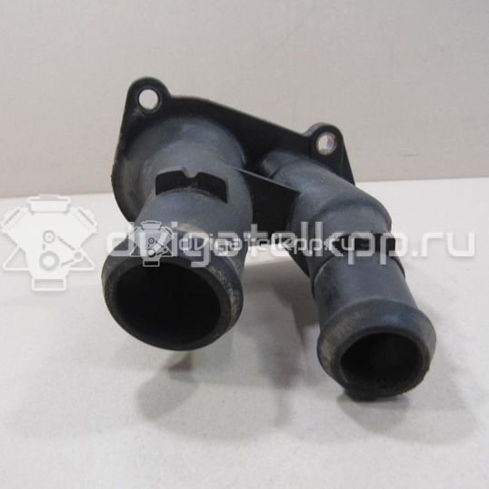 Фото Крышка термостата  1707050 для Ford Fiesta / Focus / C-Max / Ka / Grand