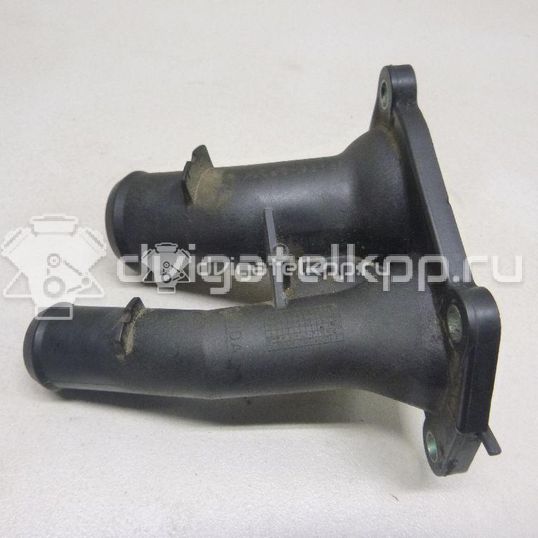 Фото Крышка термостата  1707050 для Ford Fiesta / Focus / C-Max / Ka / Grand