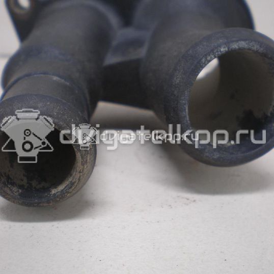 Фото Крышка термостата  1707050 для Ford Fiesta / Focus / C-Max / Ka / Grand