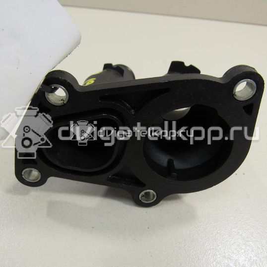Фото Крышка термостата  1707050 для Ford Fiesta / Focus / C-Max / Ka / Grand