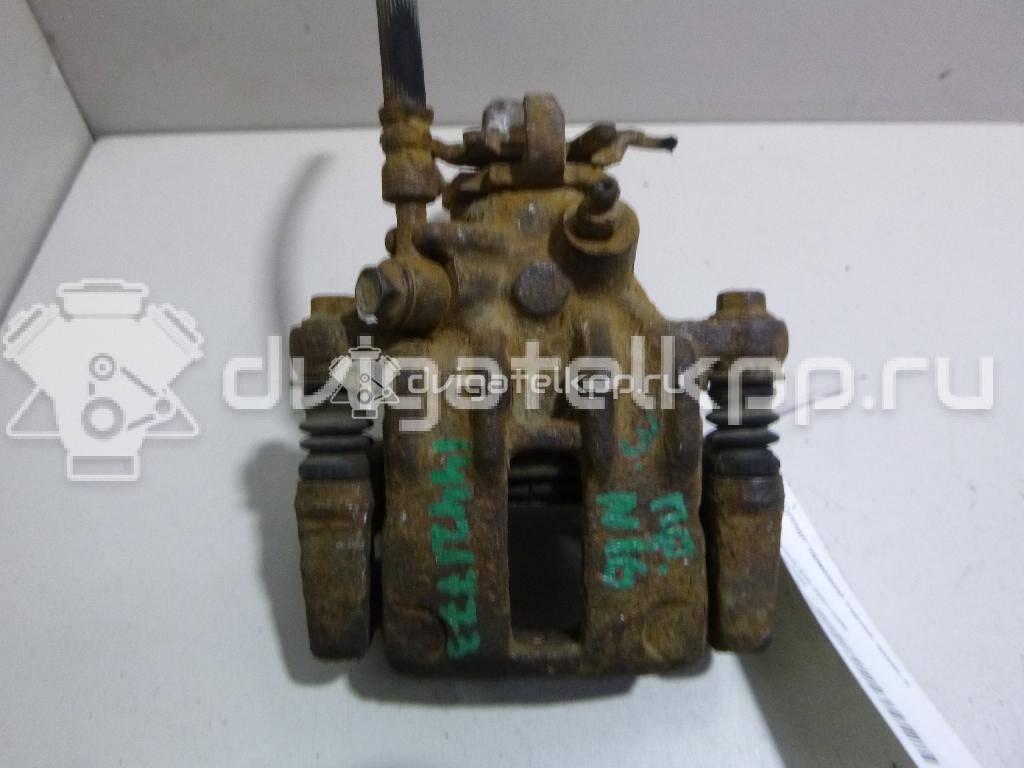 Фото Суппорт тормозной задний правый  44001BM40A для Nissan Primera / Almera {forloop.counter}}