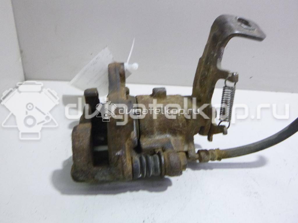 Фото Суппорт тормозной задний правый  44001BM40A для Nissan Primera / Almera {forloop.counter}}