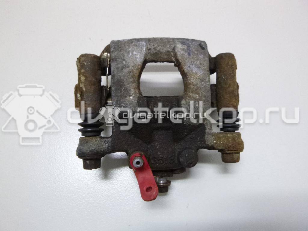 Фото Суппорт тормозной задний правый  44001EM11A для Nissan Tiida / Qashqai / Cube Z12 / Juke F15 / Pulsar C13 {forloop.counter}}