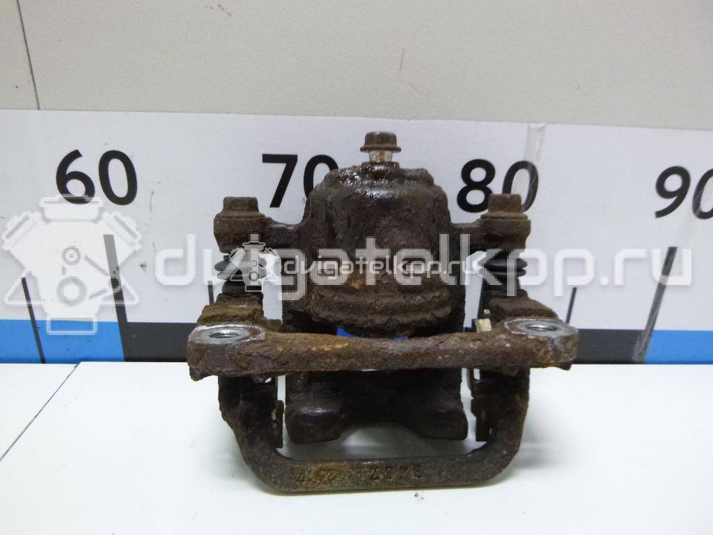 Фото Суппорт тормозной задний правый  44001EM11A для Nissan Tiida / Qashqai / Cube Z12 / Juke F15 / Pulsar C13 {forloop.counter}}