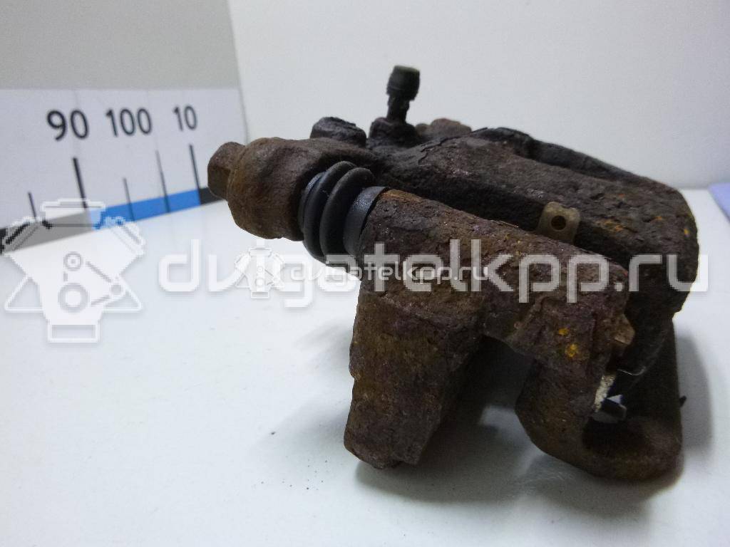 Фото Суппорт тормозной задний правый  44001EM11A для Nissan Tiida / Qashqai / Cube Z12 / Juke F15 / Pulsar C13 {forloop.counter}}
