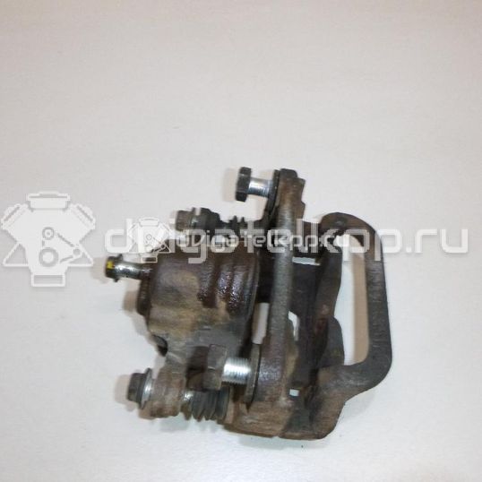 Фото Суппорт тормозной задний правый  44001EM11A для Nissan Tiida / Qashqai / Cube Z12 / Juke F15 / Pulsar C13