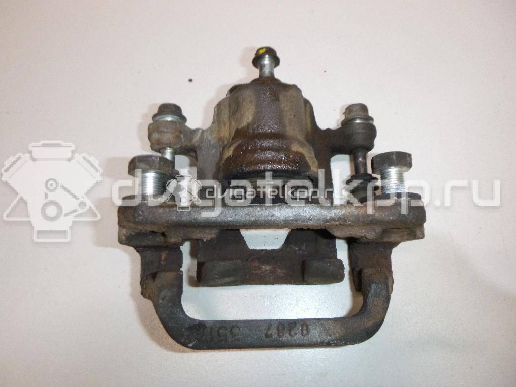 Фото Суппорт тормозной задний правый  44001EM11A для Nissan Tiida / Qashqai / Cube Z12 / Juke F15 / Pulsar C13 {forloop.counter}}