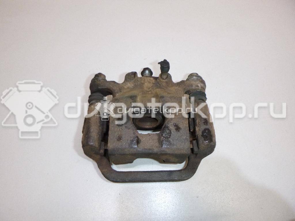 Фото Суппорт тормозной задний правый  44001EM11A для Nissan Tiida / Qashqai / Cube Z12 / Juke F15 / Pulsar C13 {forloop.counter}}