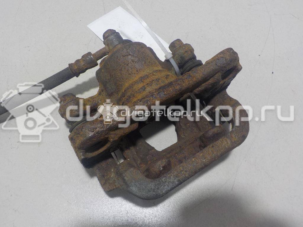 Фото Суппорт тормозной задний правый  440011KD0A для Nissan Tiida / Qashqai / Cube Z12 / Juke F15 / Pulsar C13 {forloop.counter}}