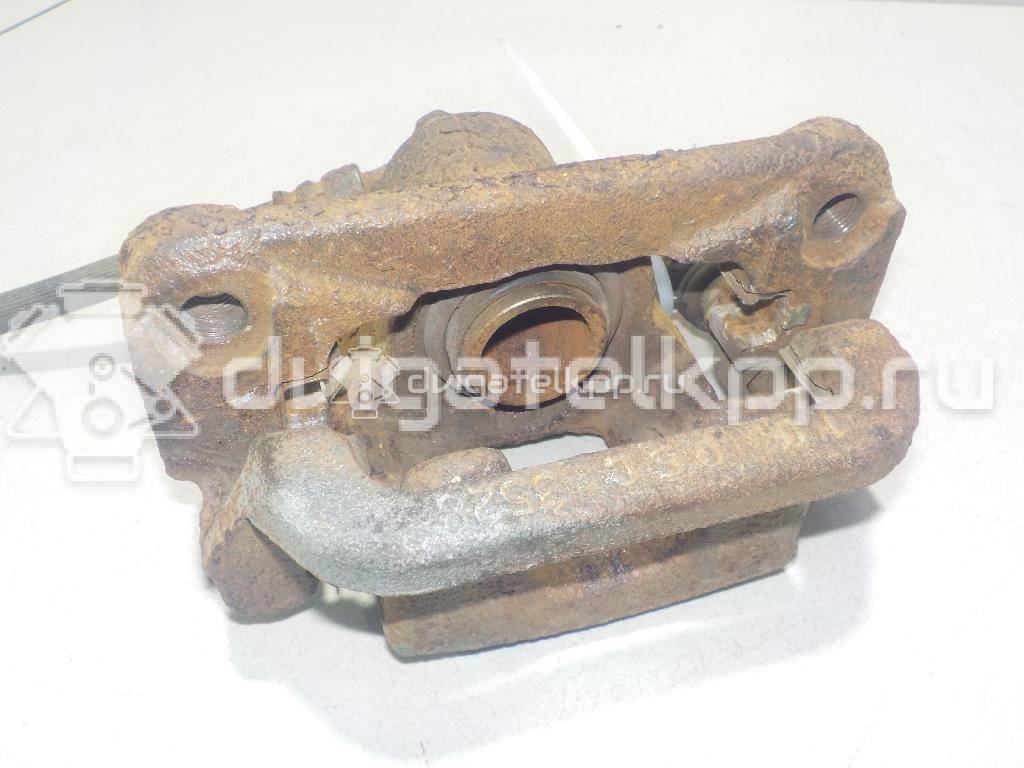 Фото Суппорт тормозной задний правый  440011KD0A для Nissan Tiida / Qashqai / Cube Z12 / Juke F15 / Pulsar C13 {forloop.counter}}