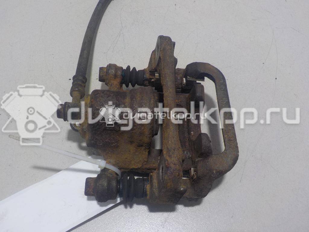 Фото Суппорт тормозной задний левый  440111KD0A для Nissan Tiida / Qashqai / Cube Z12 / Juke F15 / Pulsar C13 {forloop.counter}}