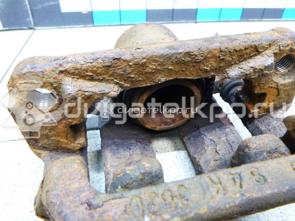 Фото Суппорт тормозной задний левый  44011JY00A для Nissan Qashqai {forloop.counter}}