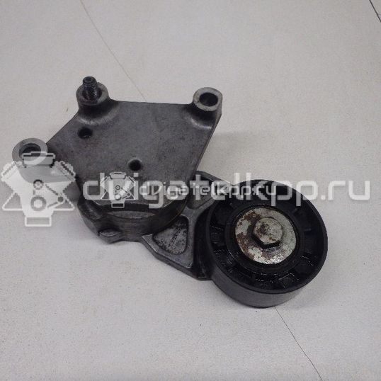 Фото Кронштейн ролика-натяжителя руч. ремня  1469717 для Ford Fiesta / Focus / Tourneo / C-Max / Galaxy