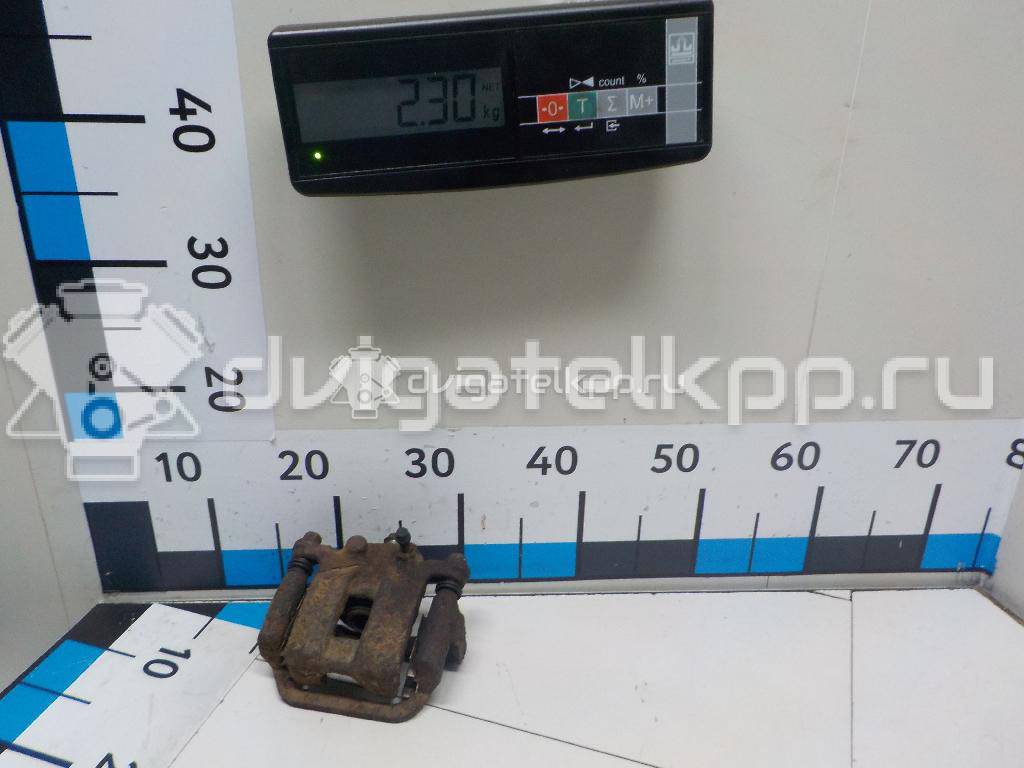 Фото Суппорт тормозной задний правый  44001JG00A для Nissan X-Trail {forloop.counter}}