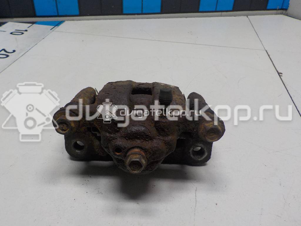 Фото Суппорт тормозной задний левый  44011JG00A для Nissan X-Trail {forloop.counter}}