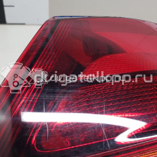 Фото Фонарь задний наружный правый  13319948 для Opel Astra