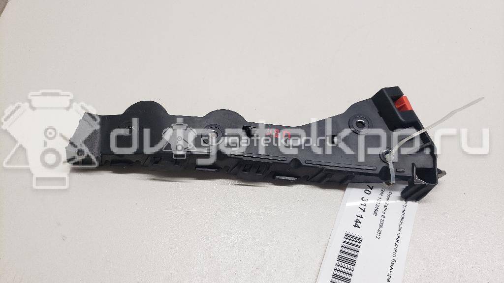 Фото Направляющая переднего бампера правая  13124998 для Opel Zafira {forloop.counter}}