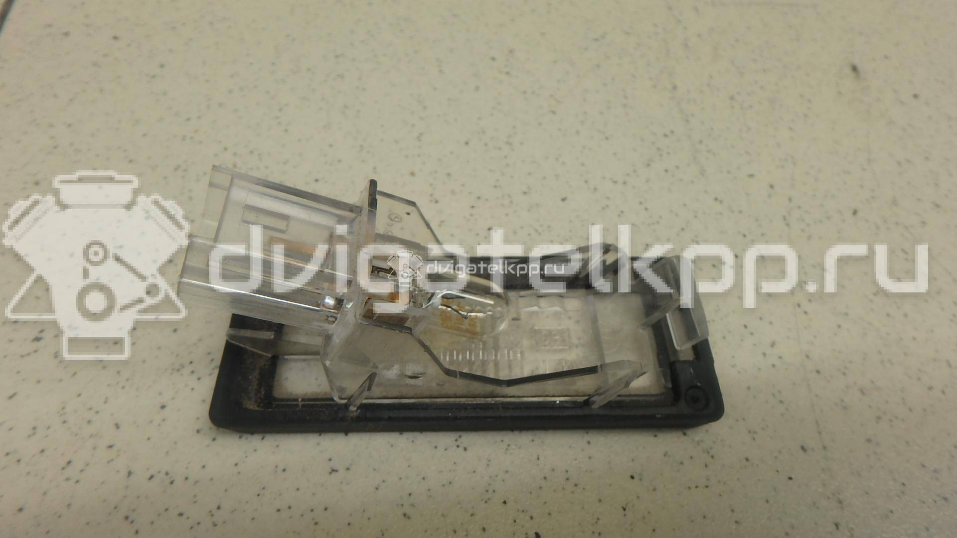 Фото Фонарь подсветки номера  8200013577 для Renault Modus Grand F Jp0 / Megane / Clio / Laguna / Scénic {forloop.counter}}
